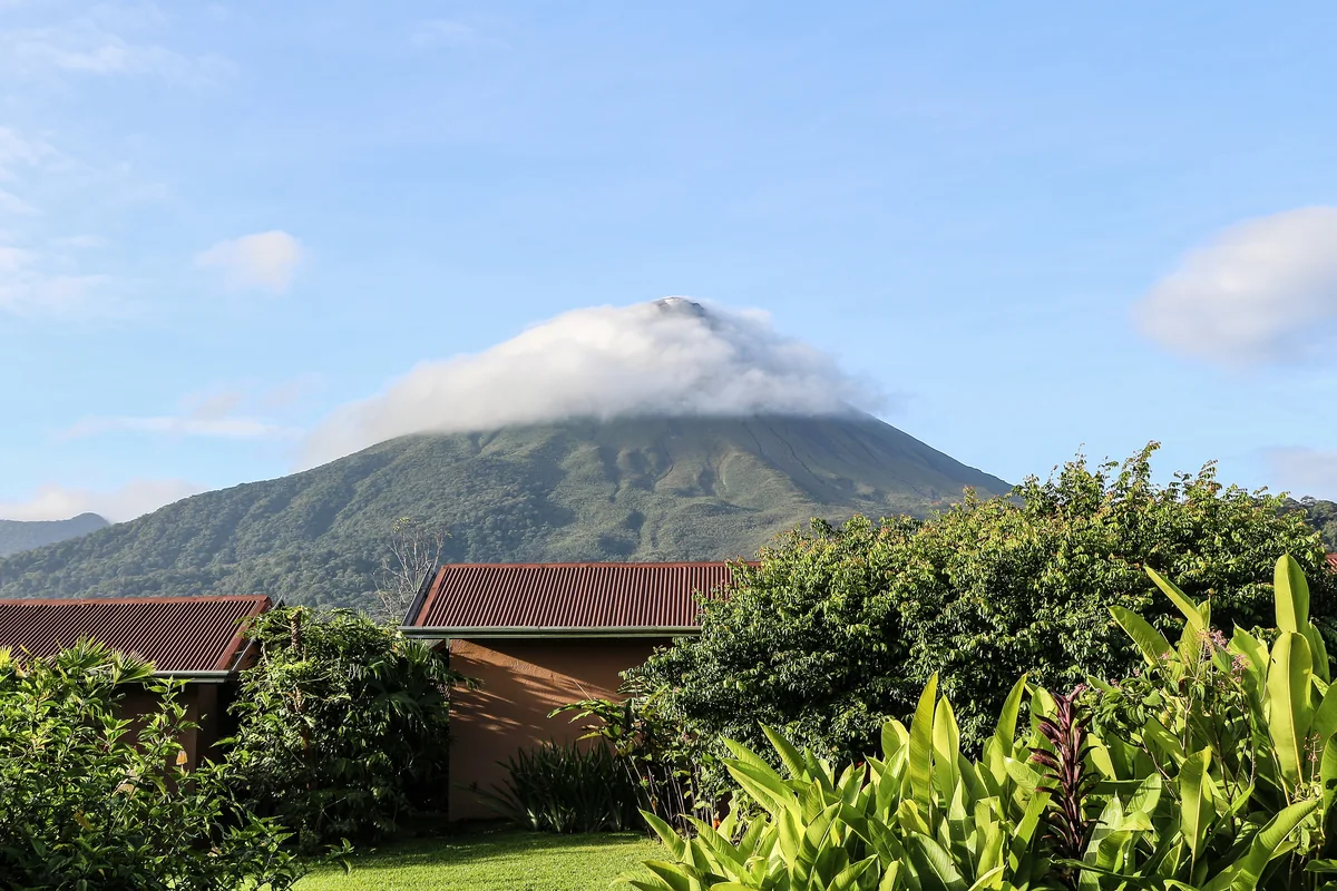 Arenal Volcano rising over the forest